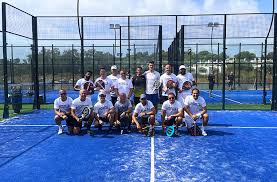 MST Education and Training Ltd corporate group on the padel courts in Marbella