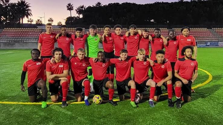 FTIFA squad on a floodlit pitch during their Marbella football tour